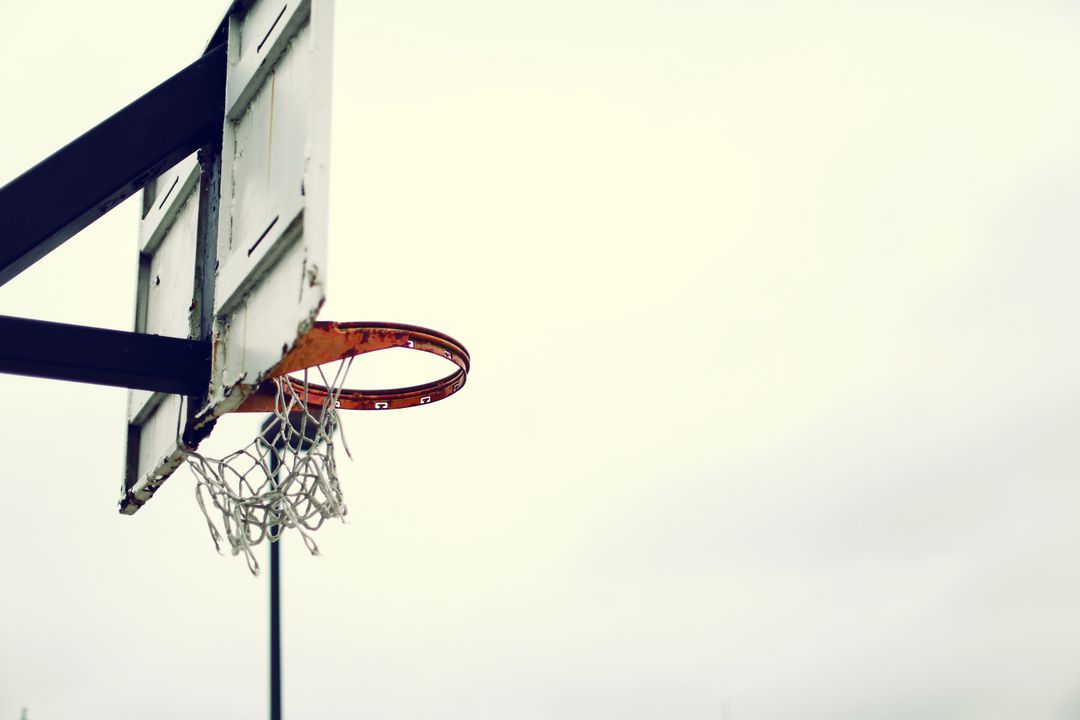 Rustic Basketball Hoop on Overcast Day