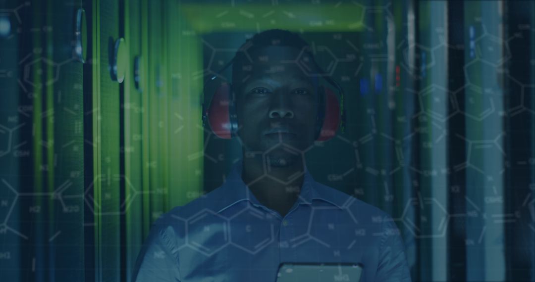 IT Specialist in Data Center with Digital Interface Display