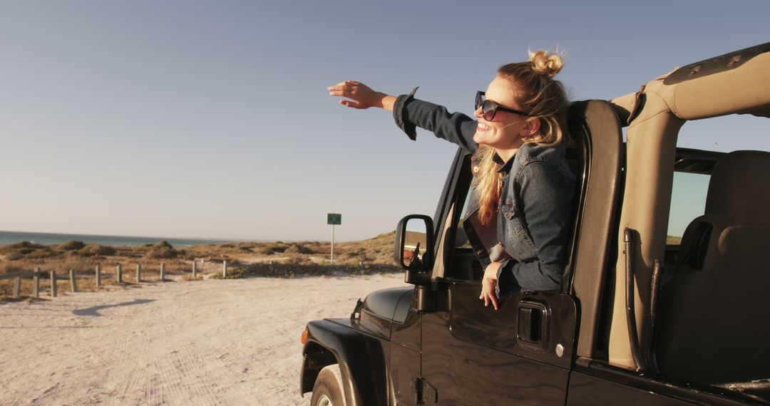 Woman Enjoying Road Trip in Beach Jeep at Sunset - Free Images, Stock Photos and Pictures on Pikwizard.com