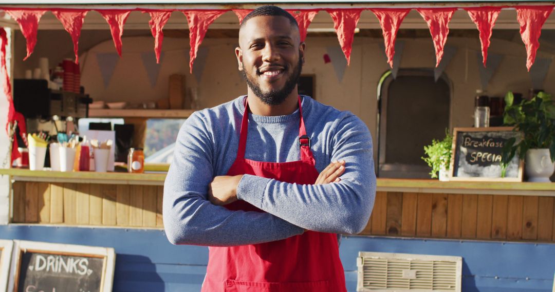 Confident Food Truck Owner Wearing Red Apron Smiling Outdoors - Free Images, Stock Photos and Pictures on Pikwizard.com