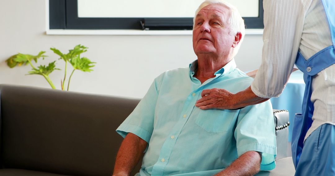 Elderly Man Receiving Healthcare Assistance at Home - Free Images, Stock Photos and Pictures on Pikwizard.com