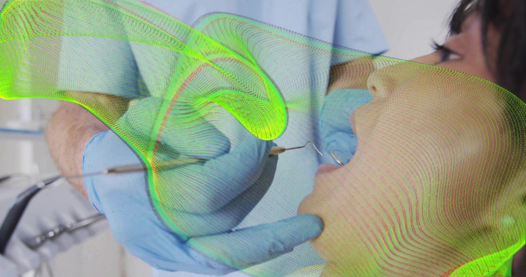 Dentist examining patient with digital 3D oral scan overlay during modern dental exam