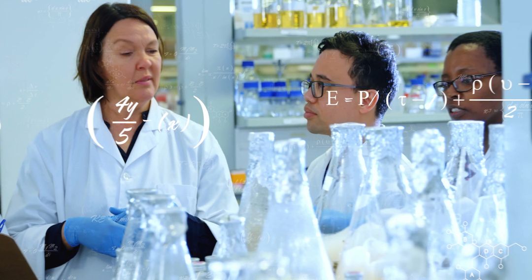 Diverse Scientists Collaborating with Data in Modern Laboratory