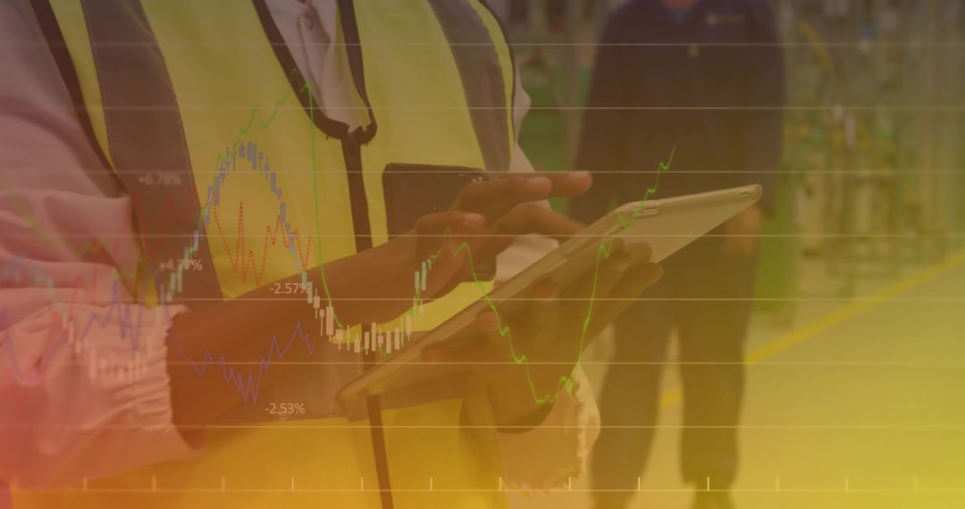 Industrial Worker Using Touchscreen Tablet for Improved Productivity