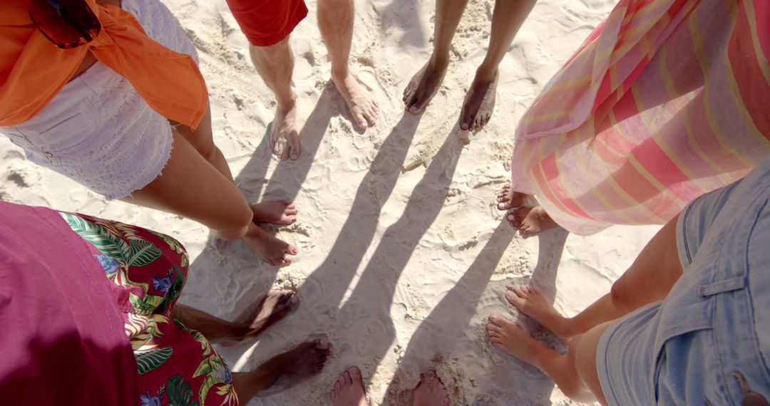 Friends Enjoying Sandy Beach Barefoot During Summer Day - Free Images, Stock Photos and Pictures on Pikwizard.com