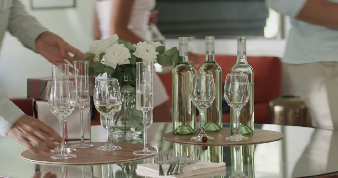 Elegant Table Setup with Wine and Flowers for Celebration