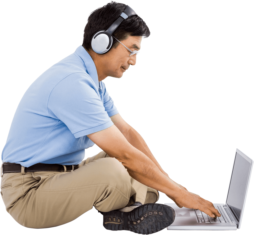 Man with Headphones Using Laptop on Transparent Background