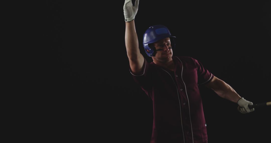 Baseball Player Celebrating Home Run in Dark Studio - Free Images, Stock Photos and Pictures on Pikwizard.com