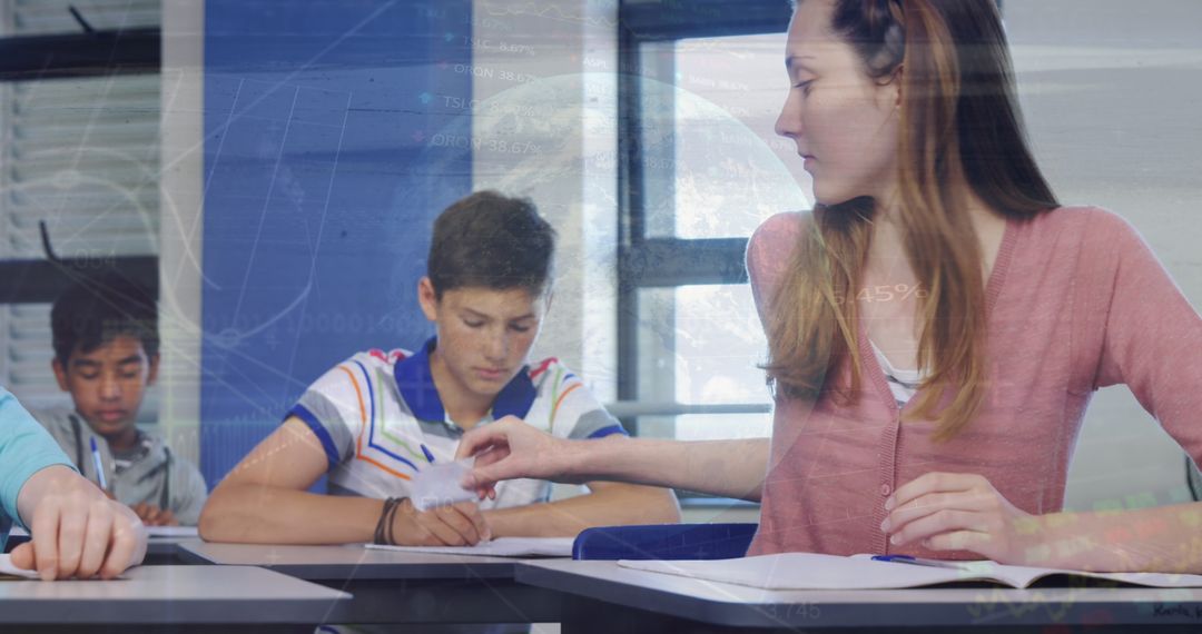 Teacher Assisting Students in Technology Integrated Classroom