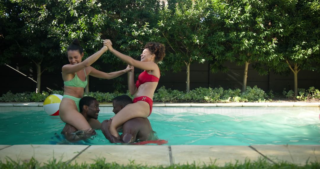 Joyous Friends Enjoying Pool Horseplay on Sunny Day
