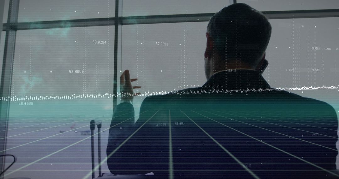 Businessman Analyzing Financial Data in Airport Terminal