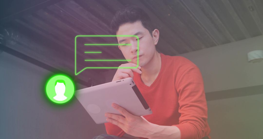 Man Engaging with Chat Interface on Tablet in Office Environment