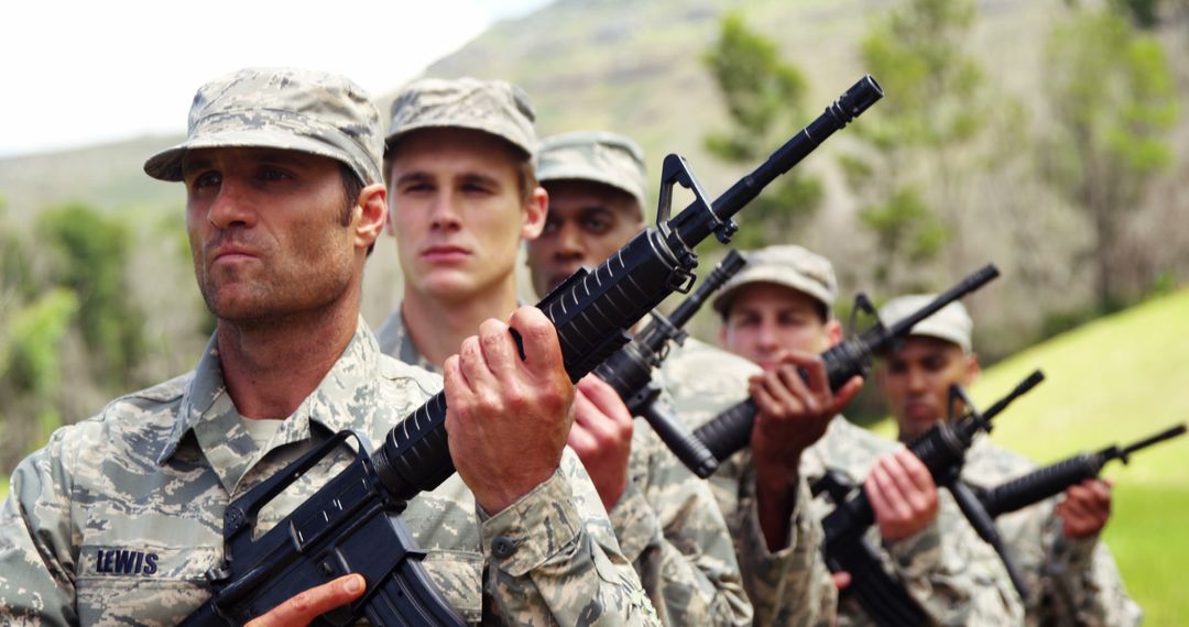 Diverse Group of Military Personnel Standing at Attention with Rifles