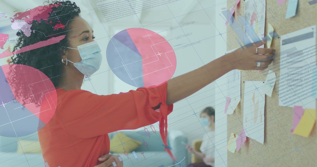 Businesswoman Analyzing Data on Corkboard Paneling