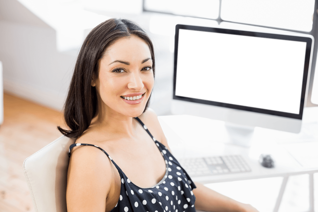 Portrait of Professional Woman Smiling by Transparent Desktop Screen