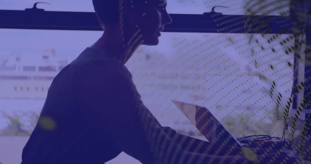 Silhouette of Businesswoman Analyzing Data with Globe Overlay