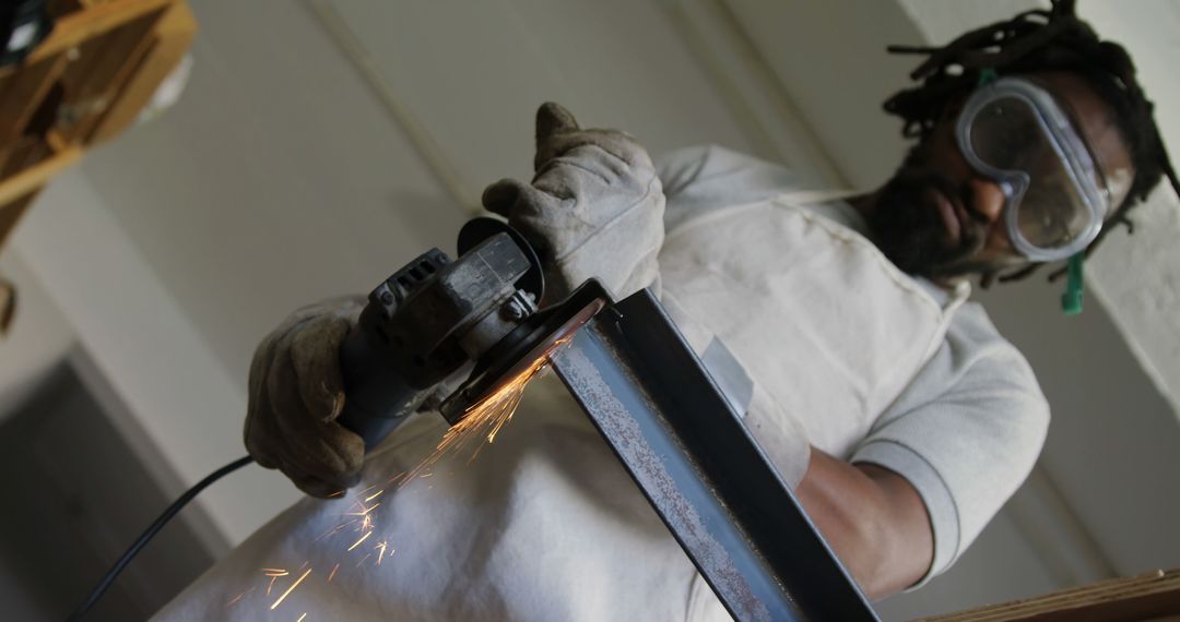 Carpenter Using Angle Grinder Wearing Safety Gear and Apron - Free Images, Stock Photos and Pictures on Pikwizard.com