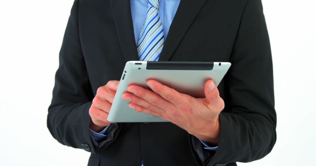 Businessman in Suit Using Digital Tablet, Close-Up of Hands - Free Images, Stock Photos and Pictures on Pikwizard.com