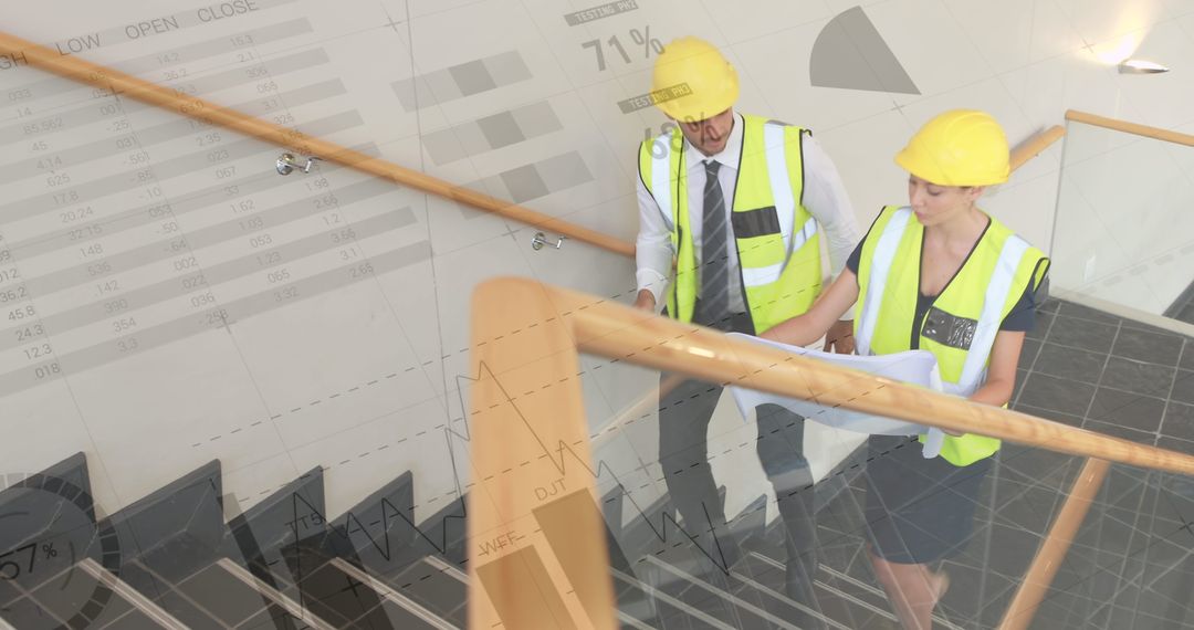 Architects Analyzing Blueprints with Data Visualizations in Background