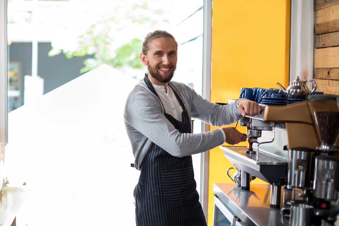 Smiling Barista Making Espresso in Modern Cafe