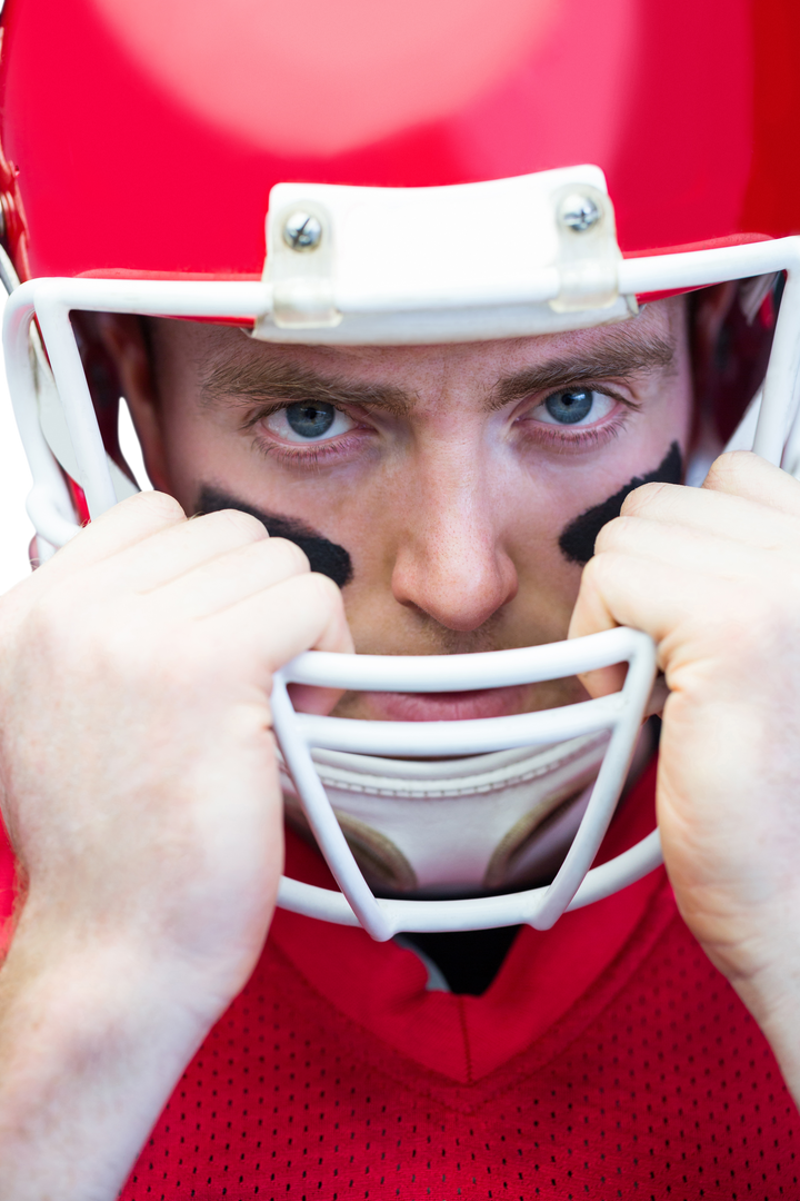 Close-up Transparent View of Focused American Football Player Holding Helmet - Download Free Stock Images Pikwizard.com