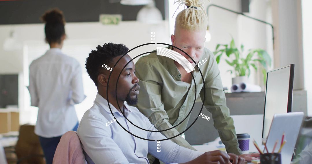 Collaborating coworkers reviewing interactive dashboard with HUD overlay in modern office