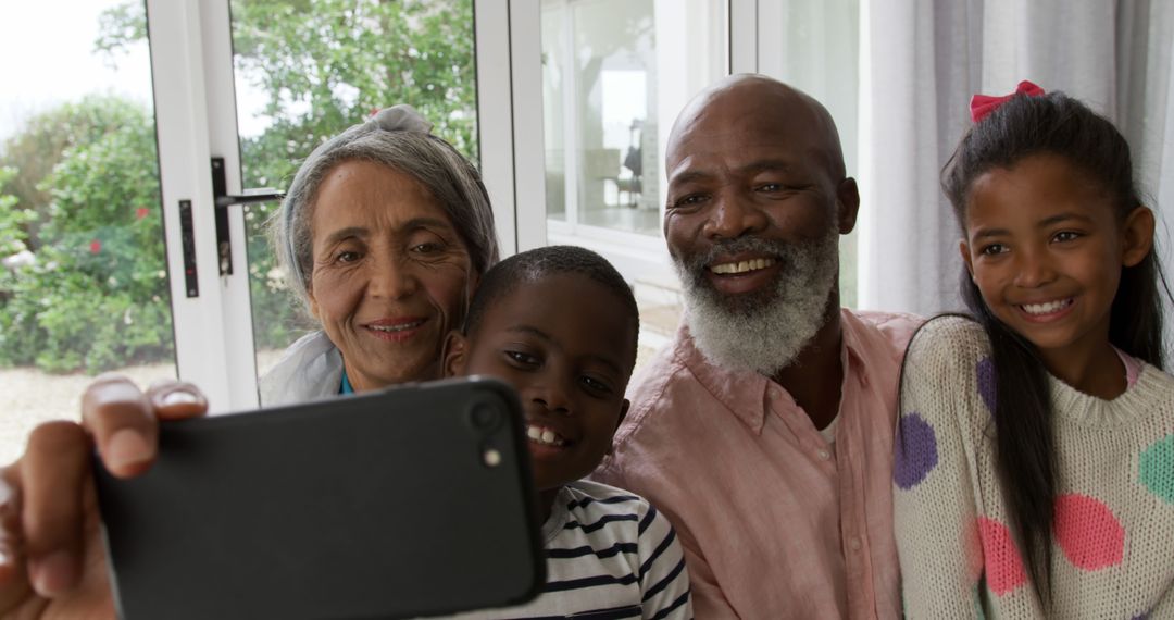 Happy Multi-Generational African American Family Taking Selfie at Home - Free Images, Stock Photos and Pictures on Pikwizard.com