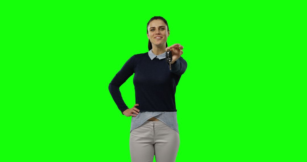 Happy Female Professional Pointing Forward with Confidence on Green Screen - Free Images, Stock Photos and Pictures on Pikwizard.com