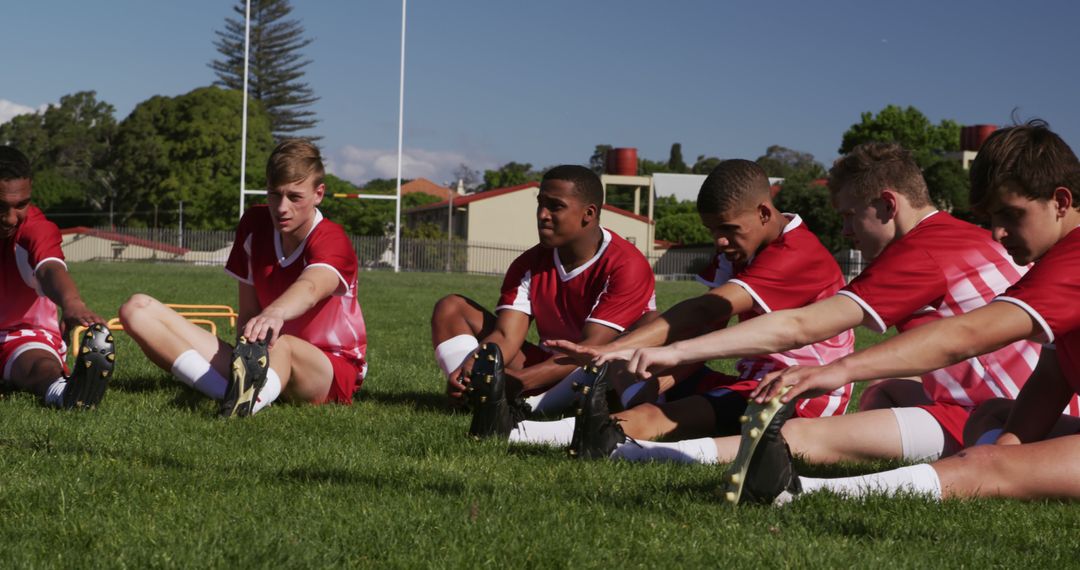 Youth Soccer Team Stretching on Field During Training - Free Images, Stock Photos and Pictures on Pikwizard.com