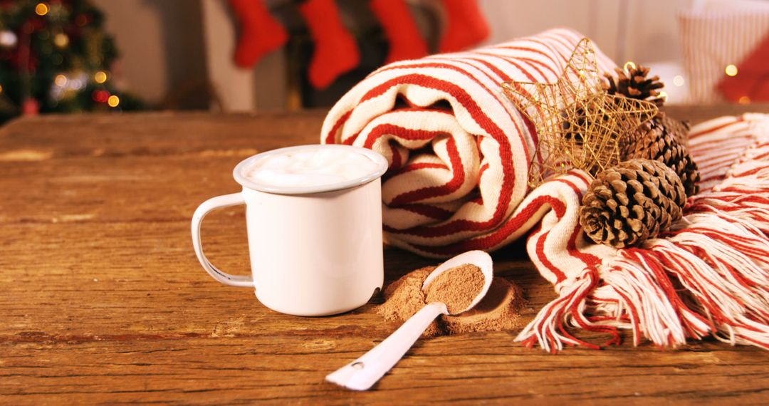 Cozy Hot Chocolate and Blanket on Wooden Table - Free Images, Stock Photos and Pictures on Pikwizard.com