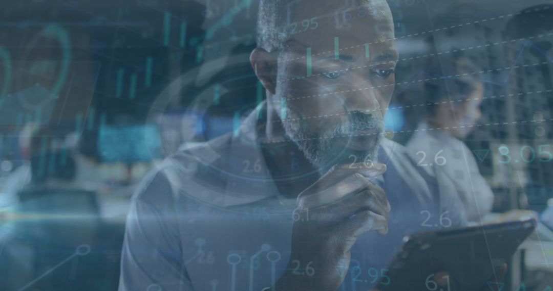Businessman Analyzing Data on Tablet with Digital Interface Overlay