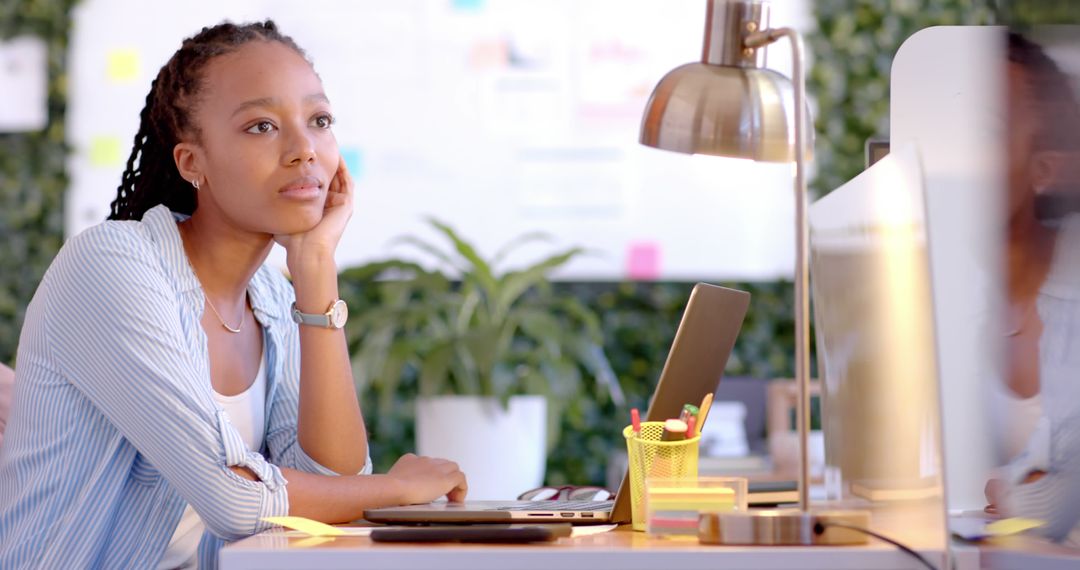 Thoughtful African American Woman Pondering at Office Desk - Free Images, Stock Photos and Pictures on Pikwizard.com