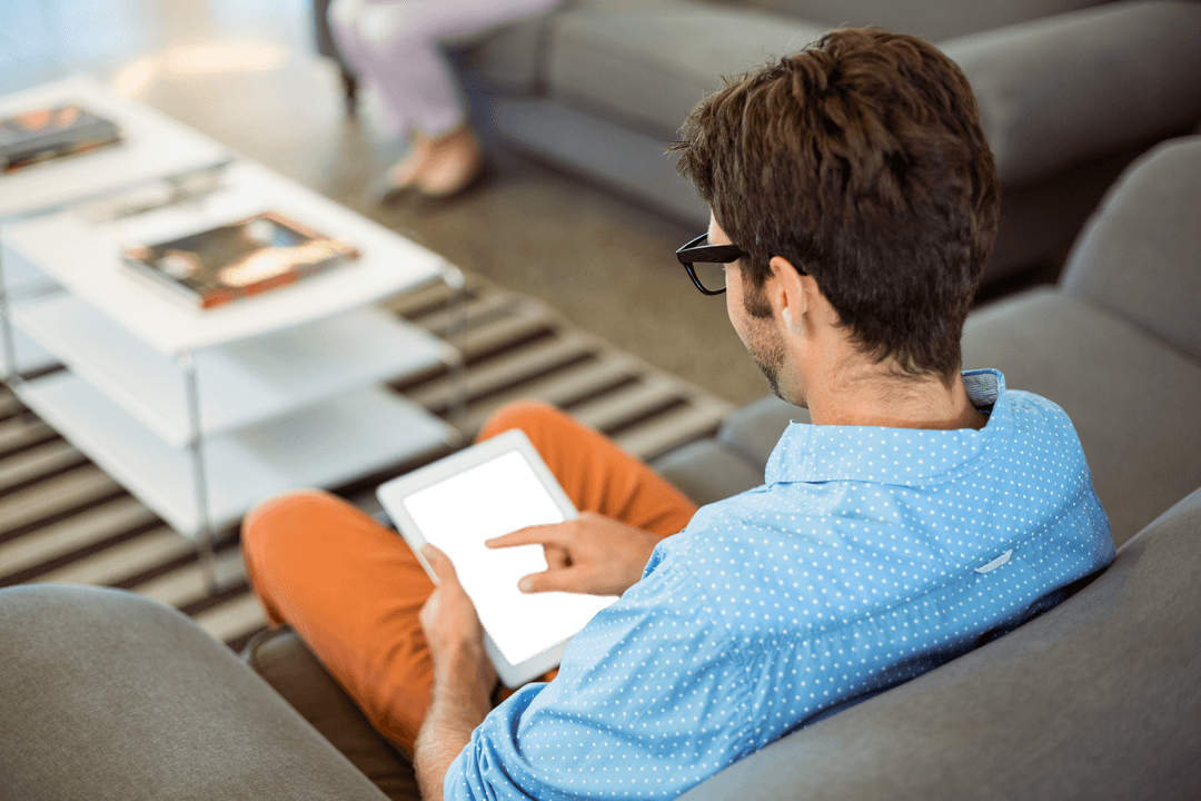 Man engaged with tablet screen, clean transparent blank display