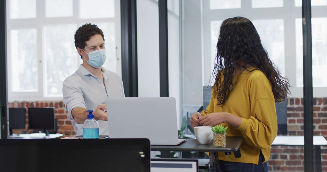 Colleagues Collaborating with Face Masks in Modern Office