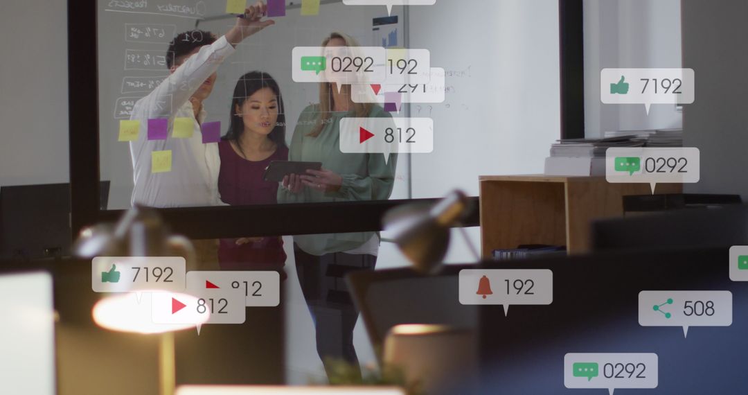 Diverse Team Analyzing Digital Social Media Insights on Glass Wall