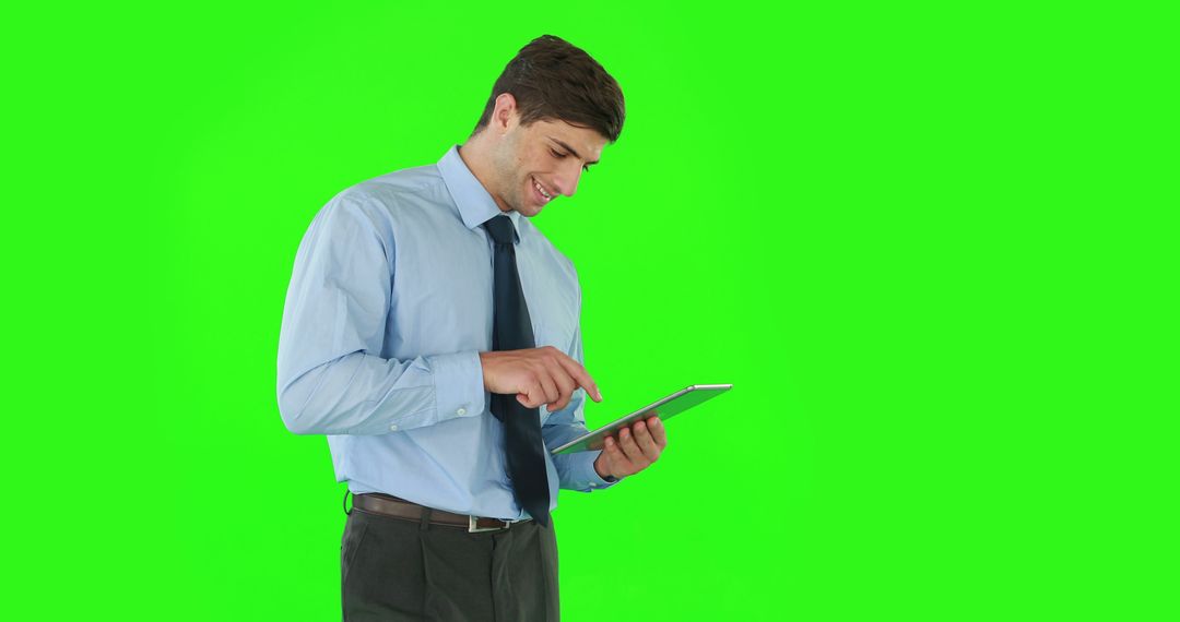 Businessman Using Tablet Green Screen Background - Free Images, Stock Photos and Pictures on Pikwizard.com