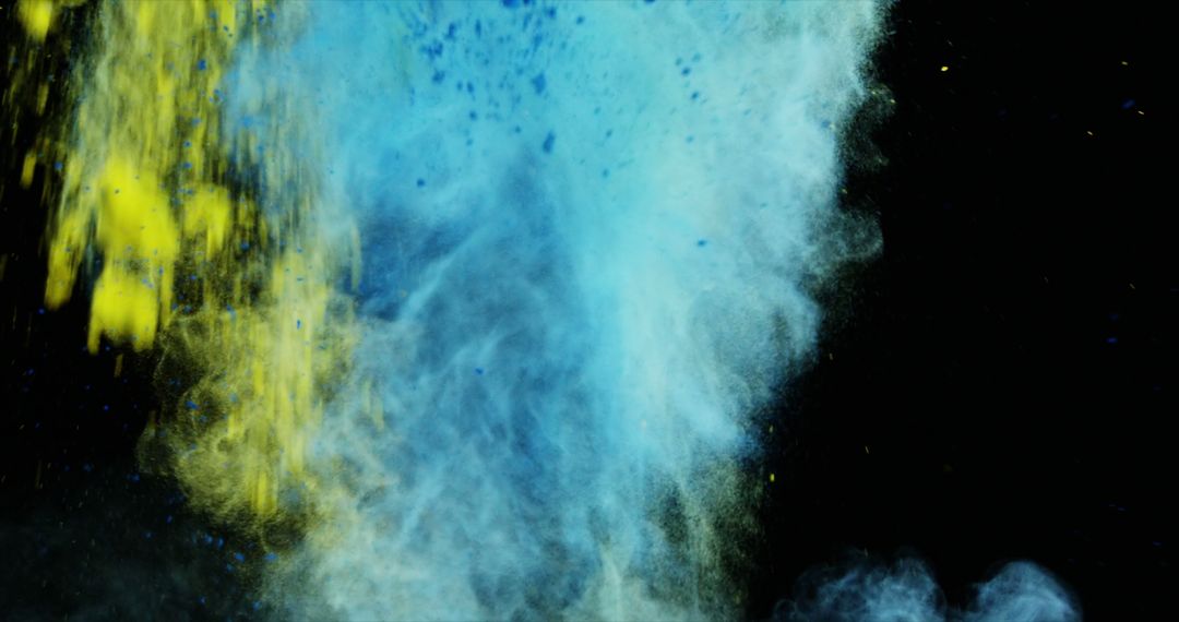 Yellow and Blue Powder Experiments Against Black Background - Free Images, Stock Photos and Pictures on Pikwizard.com