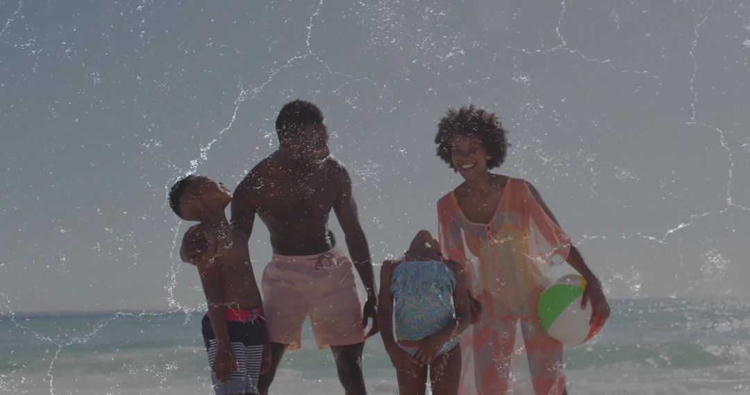 Joyful Family Enjoying Beach Day with Inflatable Beach Ball