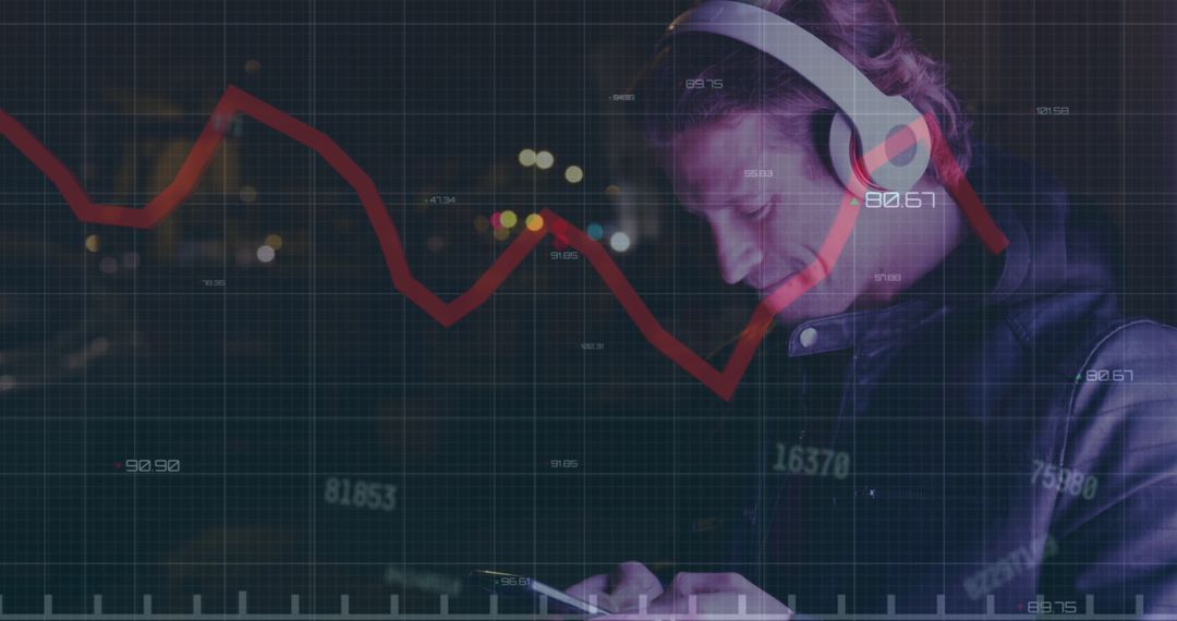 Man Engaging in Technology with Financial Data Display Overlay