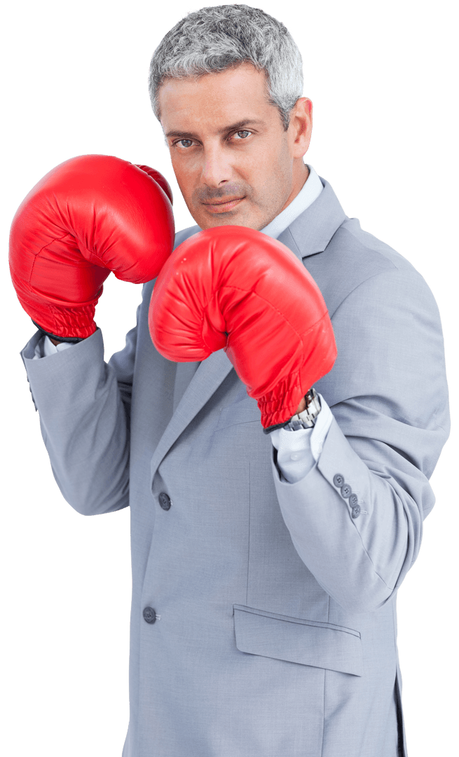 Confident Businessman in Suit Wearing Red Boxing Gloves Transparent Background