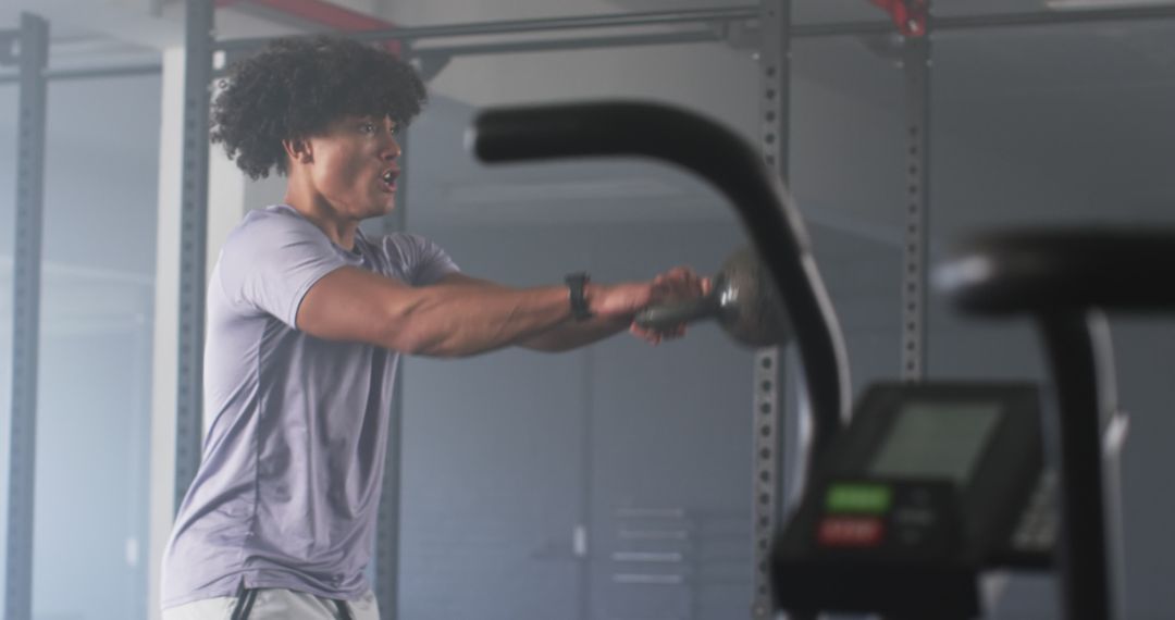 Man Stretching Arms in Gym Before Workout, Fitness Preparation