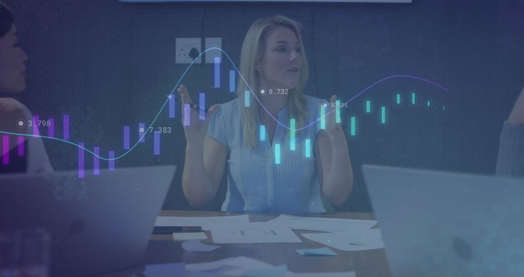 Businesswoman Analyzing Data with Digital Charts in Office
