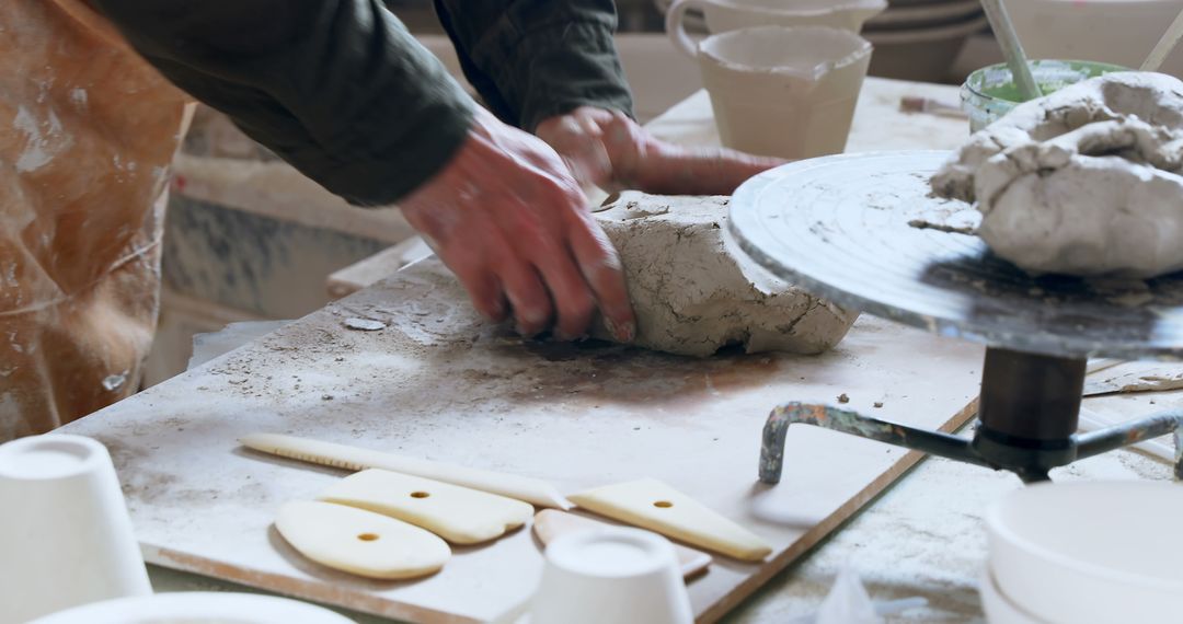 Hands Shaping Clay in Artisan Pottery Workshop - Free Images, Stock Photos and Pictures on Pikwizard.com