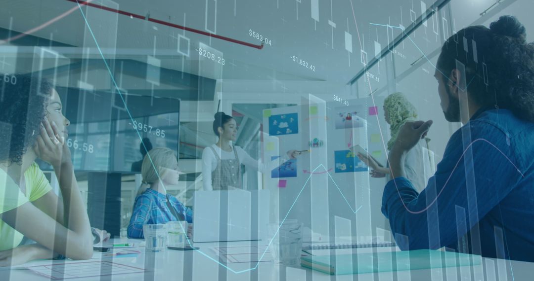 Diverse Team Discussing Data in Modern Office Setting