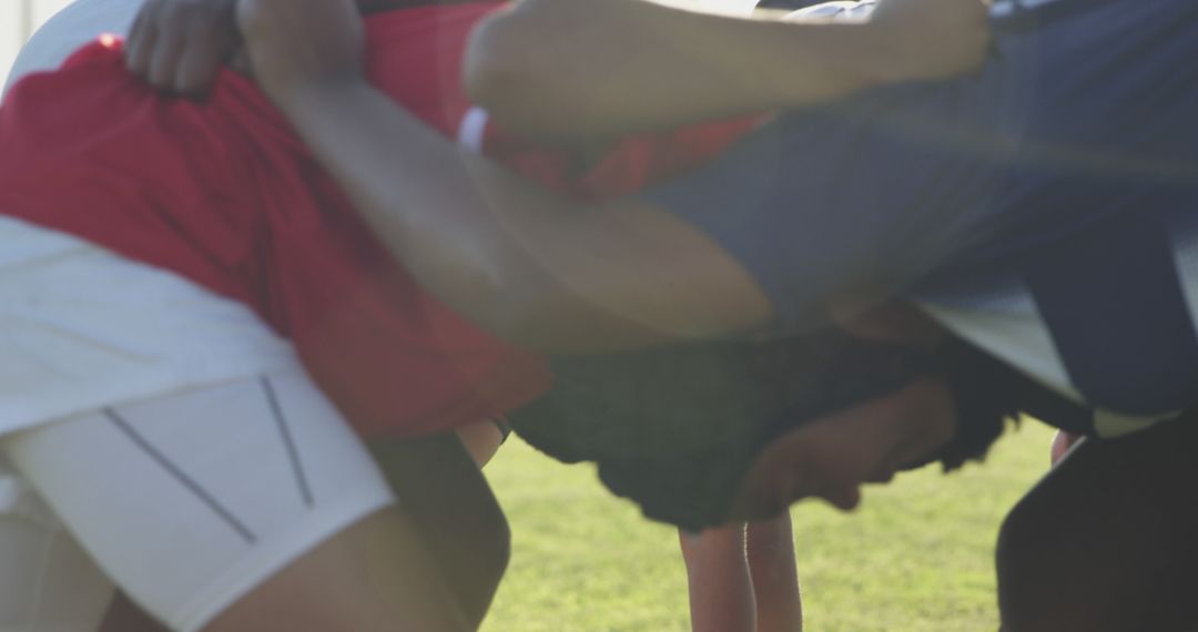 Rugby Players Engaging in Scrum on Sunny Field - Free Images, Stock Photos and Pictures on Pikwizard.com