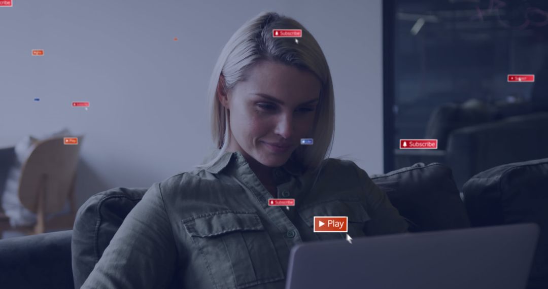 Smiling Woman Engaging with Social Media Notifications on Laptop