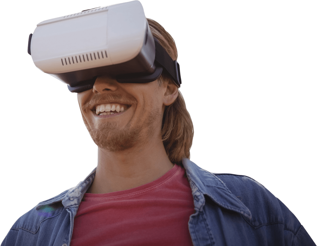 Smiling Young Man Using Virtual Reality Simulator on Transparent Background