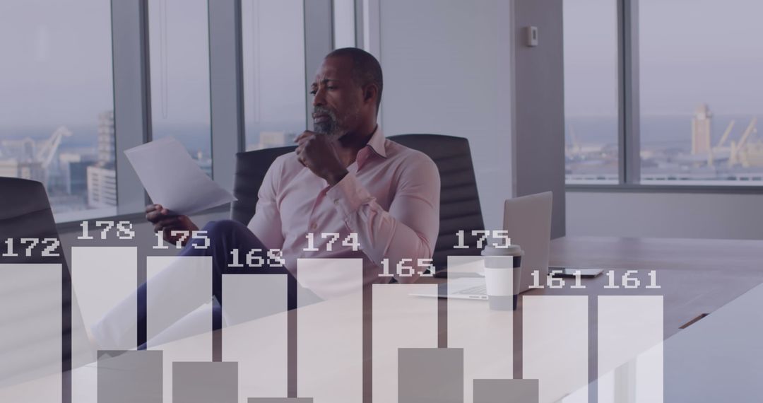 Businessman Analyzing Data Insights in Office