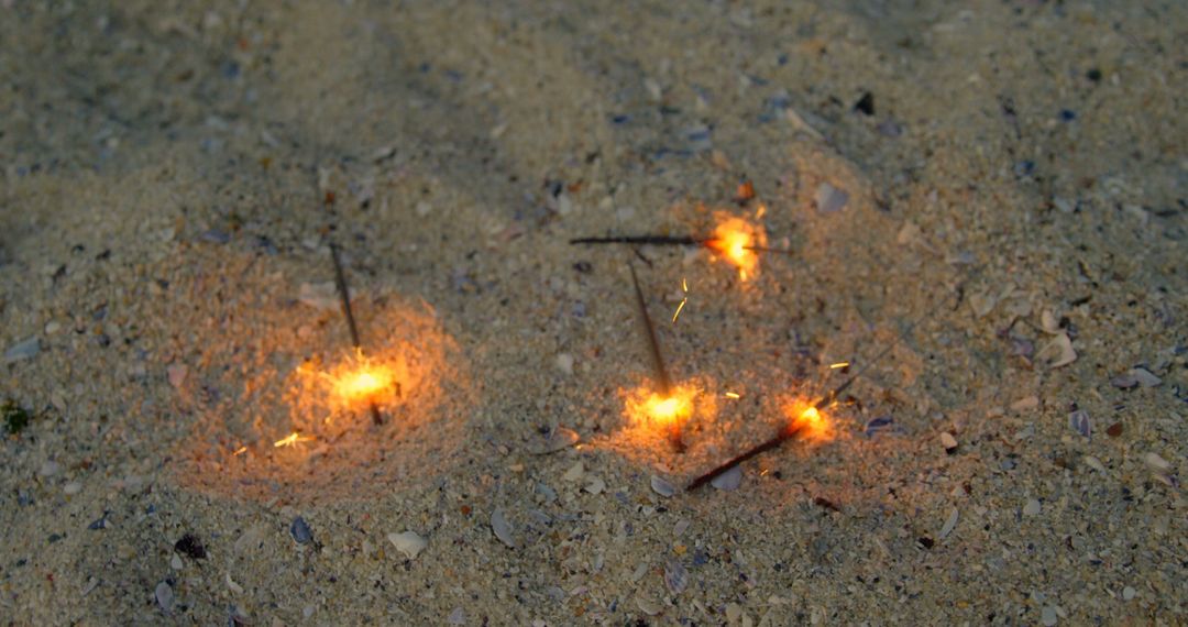 Burning Matches Stuck in Sand - Free Images, Stock Photos and Pictures on Pikwizard.com