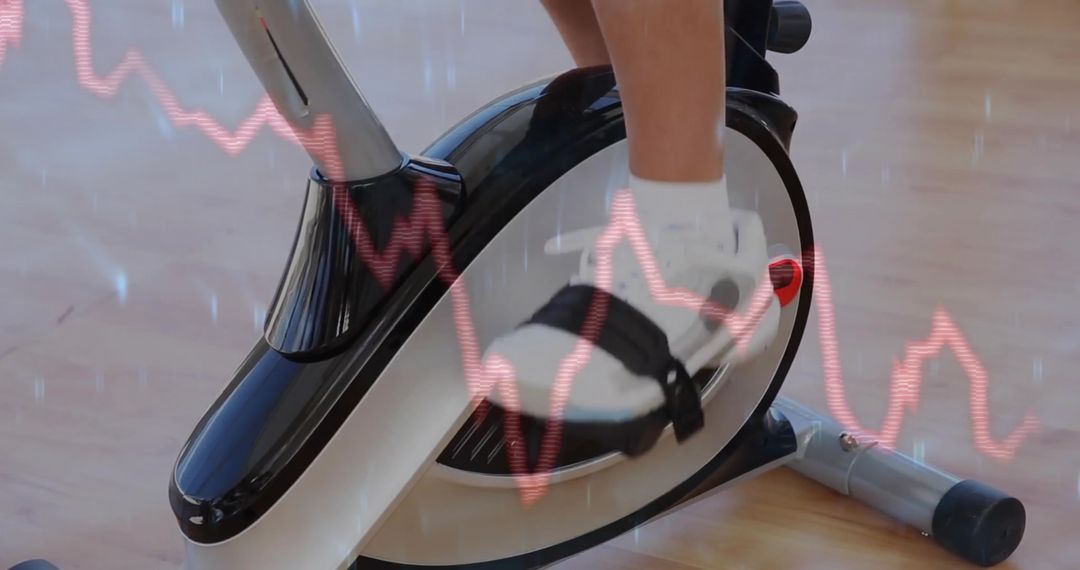 Exercising Legs on Stationary Bike with Health Data Overlay